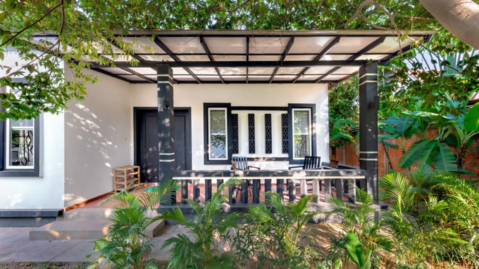 Banana Resort — jardin et cocotiers