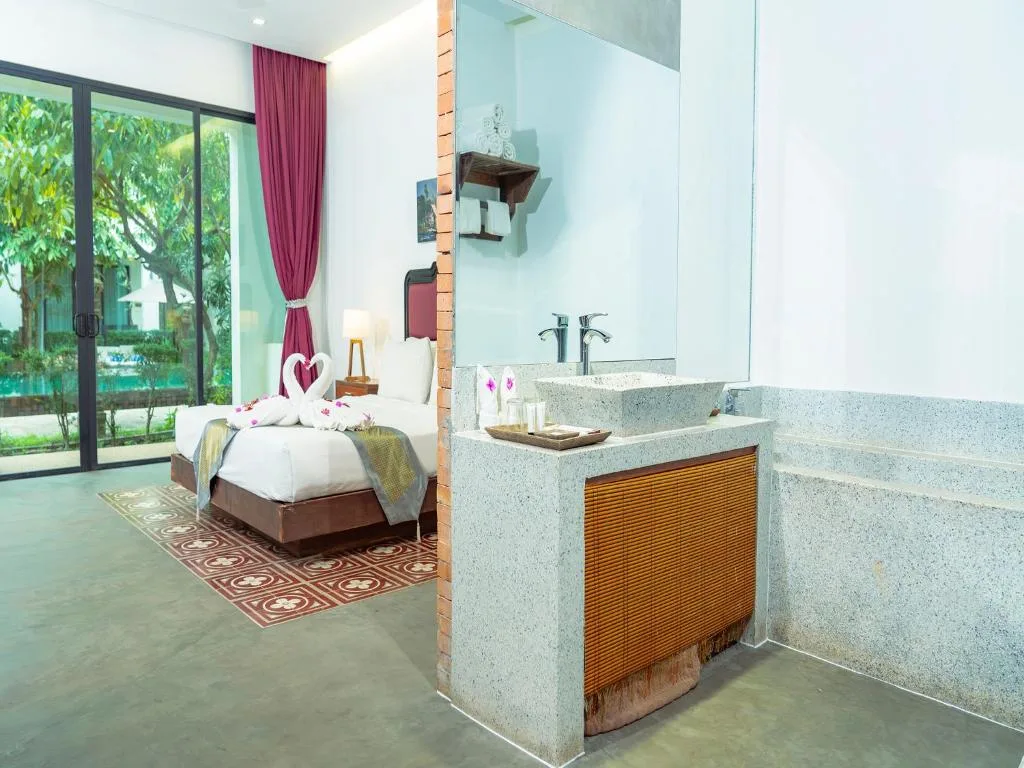 Tanei Angkor Resort & Spa — chambre et décoration khmère