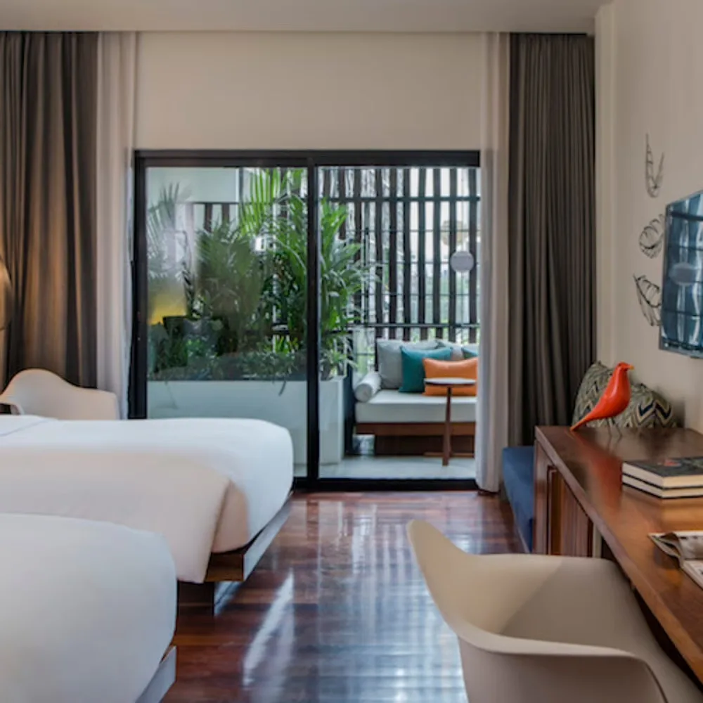 The Aviary Hotel — chambre thème oiseau